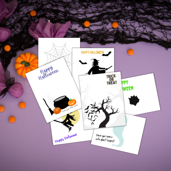 purple background with lace and pumpkins with halloween sheets shown