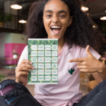 Girl Figuring out the answers putting to the game board