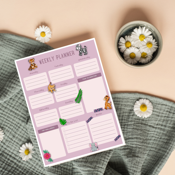 orange background daisy flowers, and green cloth with a weekly sheet showing purple background with baby jungle animals shown