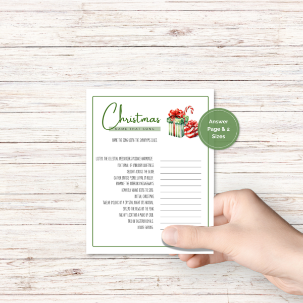 wood background, with a hand holding the christmas party game with presents of green and red and white with candy cane with green border, has a green dot that says answer page and 2 sizes.