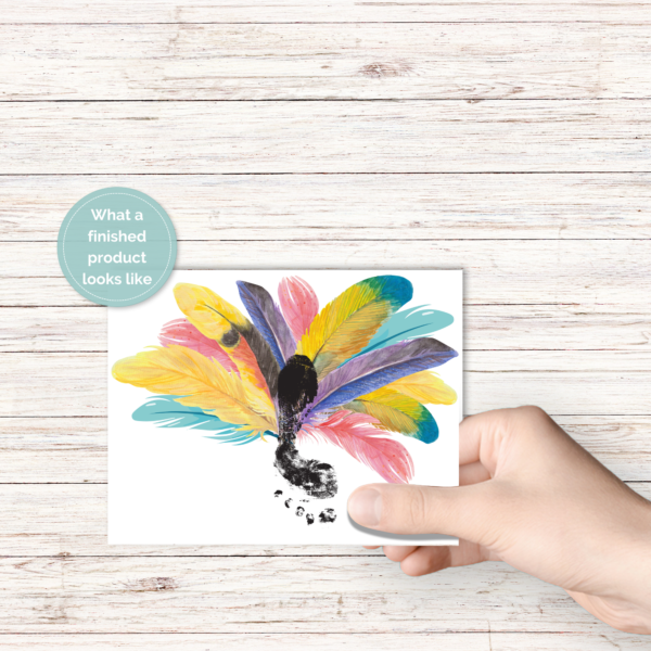 wood background, with hand holding paper with footprint in the middle of the turkey leaves or pretty bright colors to show what it looks like done. Teal circle with What a finished product looks like.