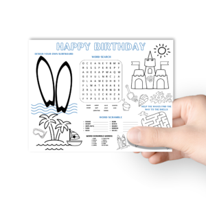 hand holding the happy birthday activity beach themed mat, maze, word search, drawing, coloring, word scramble,