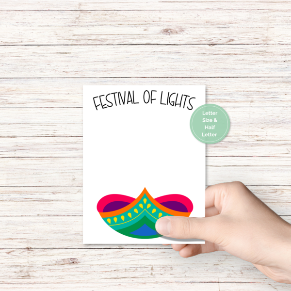 white wood background, keepsake for gifts or tracking your babies progress, shows diya colorful make a handprint flame with Festival of Lights, then fireworks with Happy Diwali.