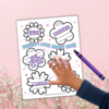 pink background with flowers and things I love about my mom with items written in each flower with a purple crayon and hand sitting on the letter size printable.